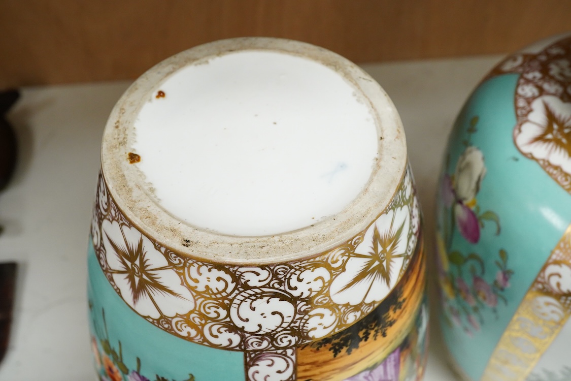 A pair of late 19th century Dresden vases and covers decorated by Helena Wolfsohn, one with damage, 34cm high